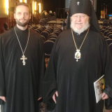 Fr Kyle Parrott with Archbishop Irénée