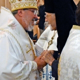Archbishop Irenée greets Metropolitan John