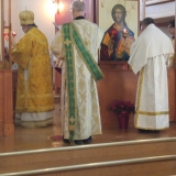 Deacon Paul ordination on Ambo with towel and Deacon Kevin