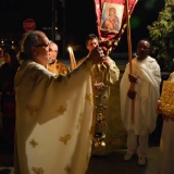 Father Pau Ruiz Gomar proclaims Christ is Risen at the door of the Church