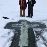 Youth preparing the cross on the ice the day before.